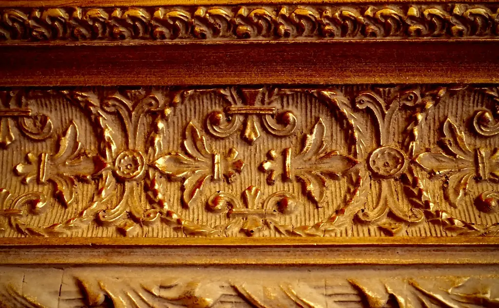 Carved wooden border with leaf and flower motifs