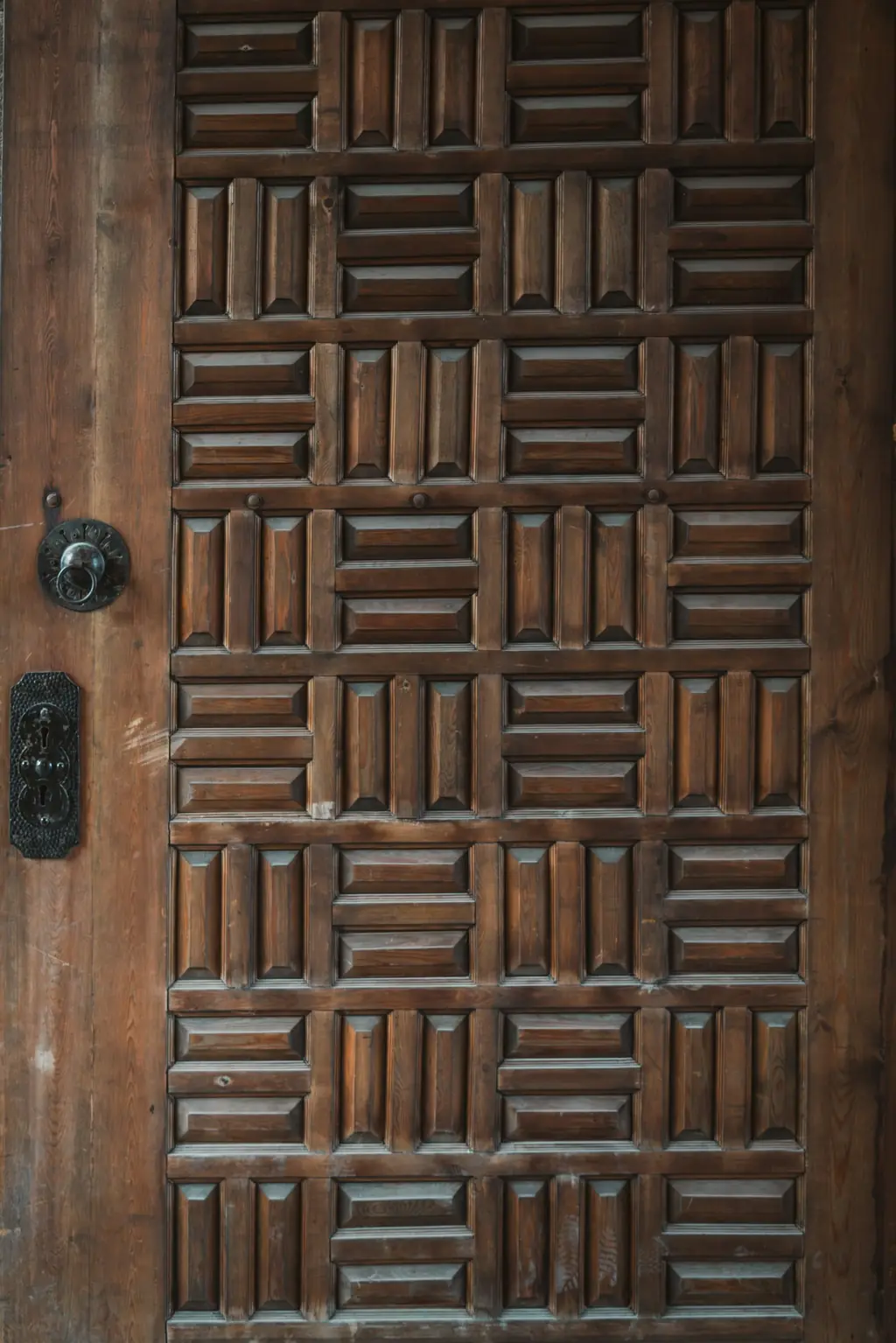 Wooden door with 3D CNC raised block pattern