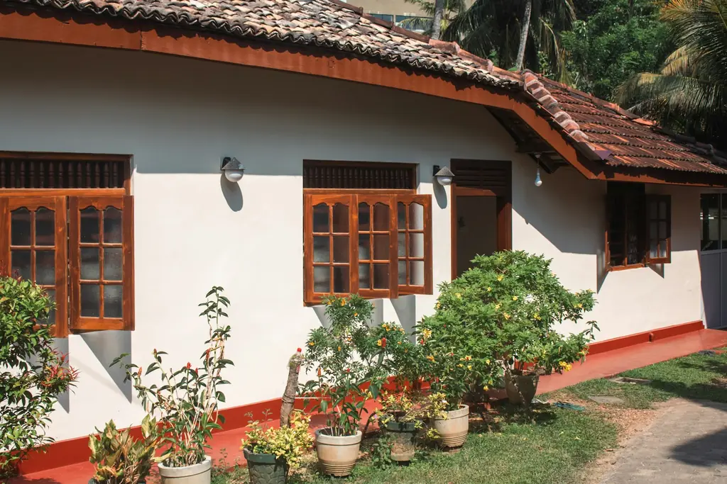 House with brown wooden window frames