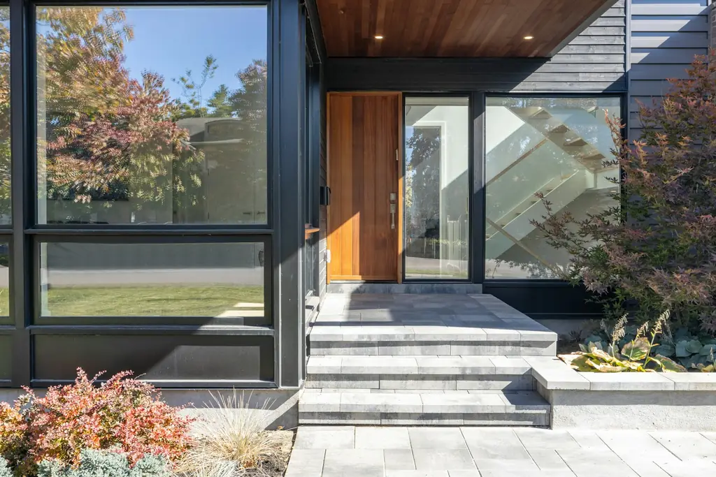 Modern house entrance with a wooden door
