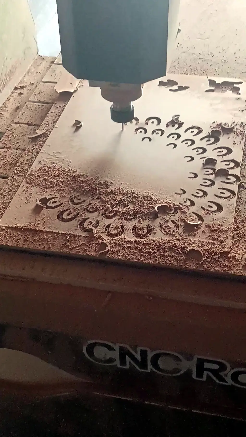Our CNC router cutting a jaali pattern into a board