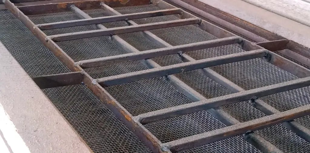 Wooden window frames with mesh and grill